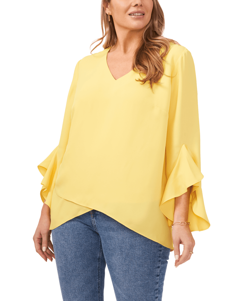 Front of a model wearing a size 1X Natalie Flutter Sleeve Tunic in SUNBURST by Vince Camuto. | dia_product_style_image_id:260953